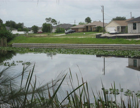 Działka na sprzedaż, Usa Cape Coral 1717 NW 21st Place, 78 000 dolar (298 740 zł), 1092,65 m2, 99188015